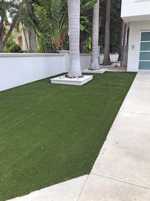 Artificial turf provides a consistently green and manicured appearance year-round